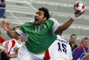 Algeria's Abderrahim Berriah attempts to score next to Russia's