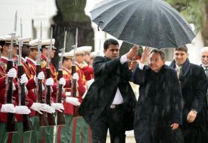 Cuba's President Raul Castro reviews an honour guard during