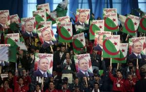 Supporters of Algeria's President Abdelaziz Bouteflika attend his official
