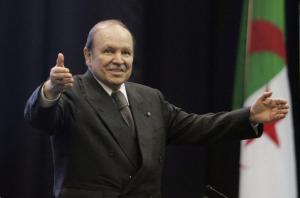 Algeria's President Abdelaziz Bouteflika waves during a speech to