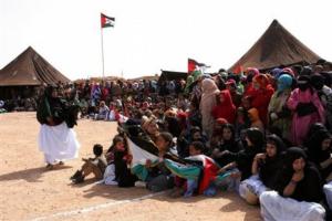 Saharawi refugees attend a ceremony , Saturday, Feb. 28,