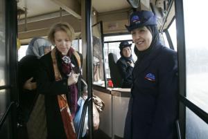 Denni Fatiha and Ghazali Ghania (R) smile as passengers