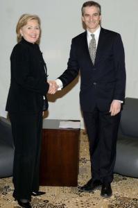 U.S. Secretary of State Hillary Clinton shakes hands Norwegian