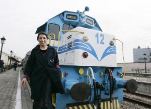 Mechanic and train driver, Khefach Karima, 30, poses in