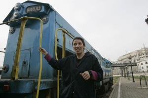 Mechanic and train driver, Khefach Karima, 30, poses in
