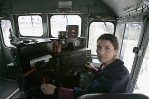 Mechanic and train driver, Khefach Karima, 30, poses in