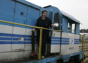 Mechanic and train driver, Khefach Karima, 30, poses in