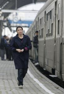 Mechanic and train driver, Khefach Karima, 30, poses walks