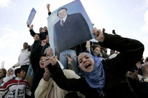 Supporters of Algeria's President Abdelaziz Bouteflika cheer during a presidential