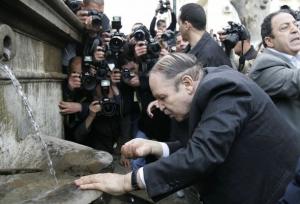 Algeria's President Abdelaziz Bouteflika drinks water during a presidential election