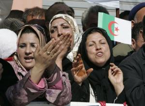 Supporters of Algeria's President Abdelaziz Bouteflika cheer during an election