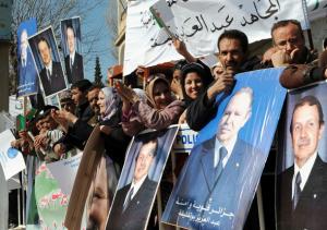 Algerians in support of President Abdelaziz Bouteflika celebrate during an
