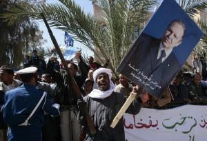 A member of a local folklore music group, holding an