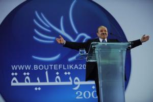 Algerian President Abdelaziz Bouteflika gestures to his supporters during an