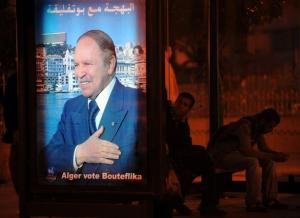 Algerian President Abdelaziz Bouteflika's electoral poster is hanged on a