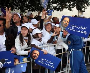 Supporters of Algerian President Abdelaziz Bouteflika gather during an election