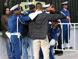 Police search bystanders attending rally to see Algeria's president Abdelaziz