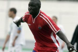 Gambia's Alasana Camara celebrates his team's goal against Algeria during