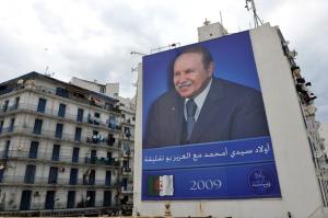 A banner of Algerian President Abdelaziz Bouteflika hangd on a