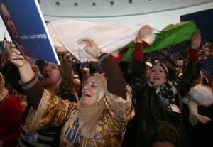 Supporters of Abdelaziz Bouteflika, Algeria's president and candidate in the