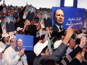 Supporters of Algerian President Abdelaziz Bouteflika, attend his last election