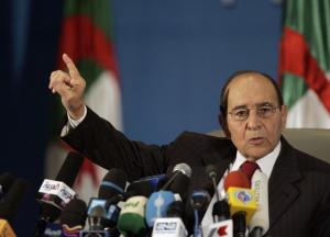 Algeria's Interior Minister Noureddine Yazid Zerhouni speaks to the media