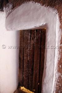 Ksar Taghit, Porte en bois de palmier