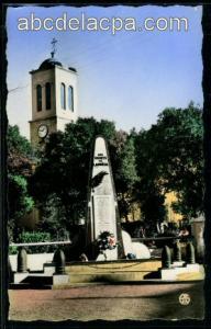 Lambèse   (Tazoult)  - le monument aux morts et le clocher de l'eglise