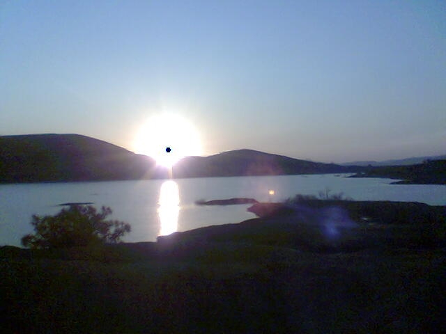 Coucher soleil avec point noir Couchers de soleil