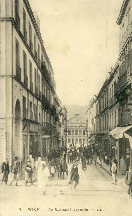 Bône . La Rue Saint Augustin .  Carte rare .  SUPERBE ANIMATION .