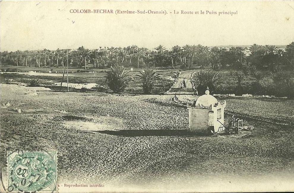 ALGERIE.COLOMB-BECHAR. LA ROUTE ET LE PUIT PRINCIPAL.