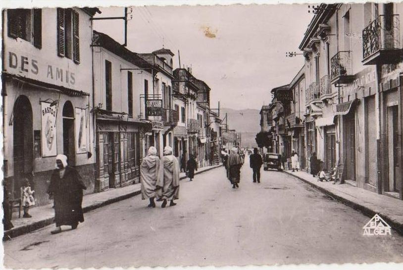 CPSM ALGERIE GUELMA Rue Saint Louis Commerce Café Bar des Amis Real Photo 1955
