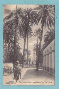 LAGHOUAT  -  Les Arcades , le Jardin et l´ Eglise  -  1915  - BELLE CARTE ANIMEE  -