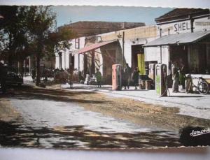 M'Sila No 7 edit Jomone La rue principale et le Poste Shell Station essence 203 Peugeot