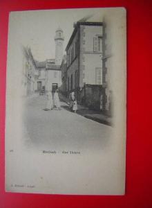 CPA DOS SIMPLE AFRIQUE ALGERIE  MEDEA  RUE THIERS ANIMEE Editeur  J GEISER ALGER NON VOYAGEE