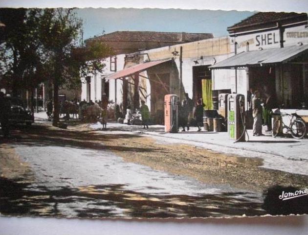 M'Sila No 7 edit Jomone La rue principale et le Poste Shell Station essence 203 Peugeot
