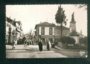 CPSM - Algérie - Médéa - Monument aux Morts et Rue Gambetta ( animée Editions Photo Africaine 24 format CPA)