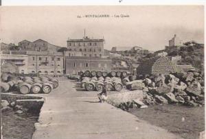 MOSTAGANEM 24 LES QUAIS (HOMME ASSIS ET TONNEAUX)