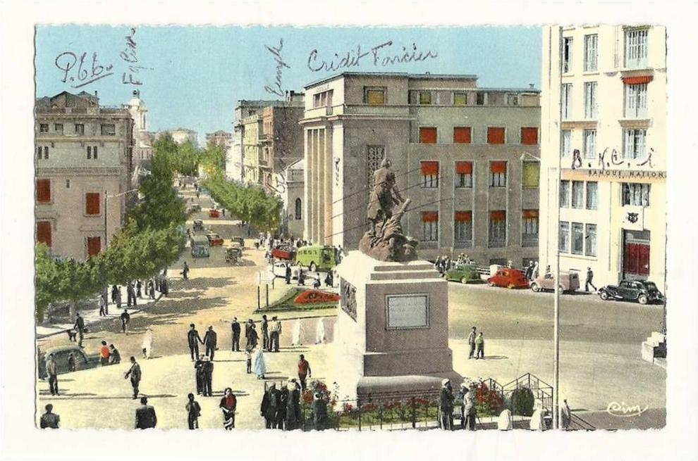 cp, Algérie, Mostaganem, Le Monument aux Morts et l'Avenue du 1er de Ligne, écrite 1963