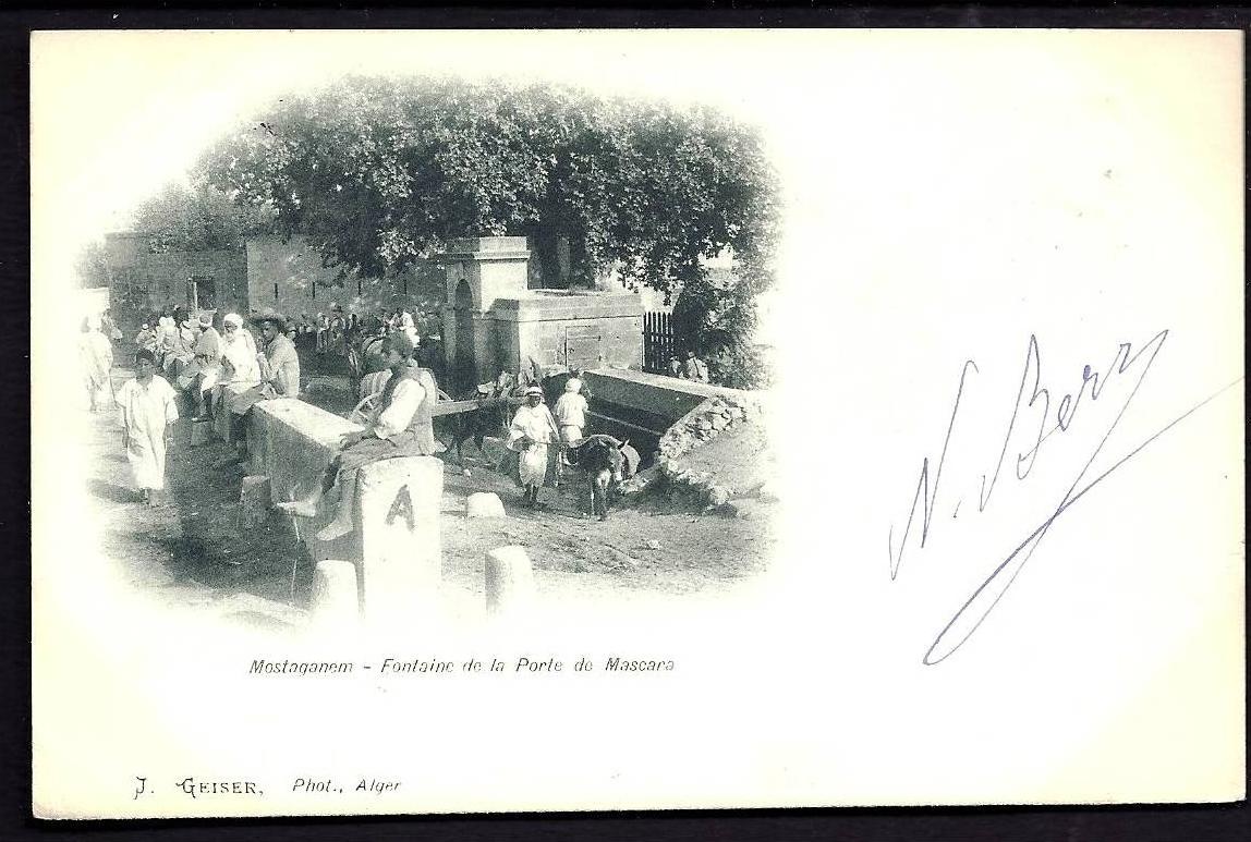CPA  PRECURSEUR- ALGÉRIE- MOSTAGANEM- FONTAINE DE LA PORTE DE MASCARA  AVEC TRES BELLE ANIMATION- ATTELAGE CITERNE-