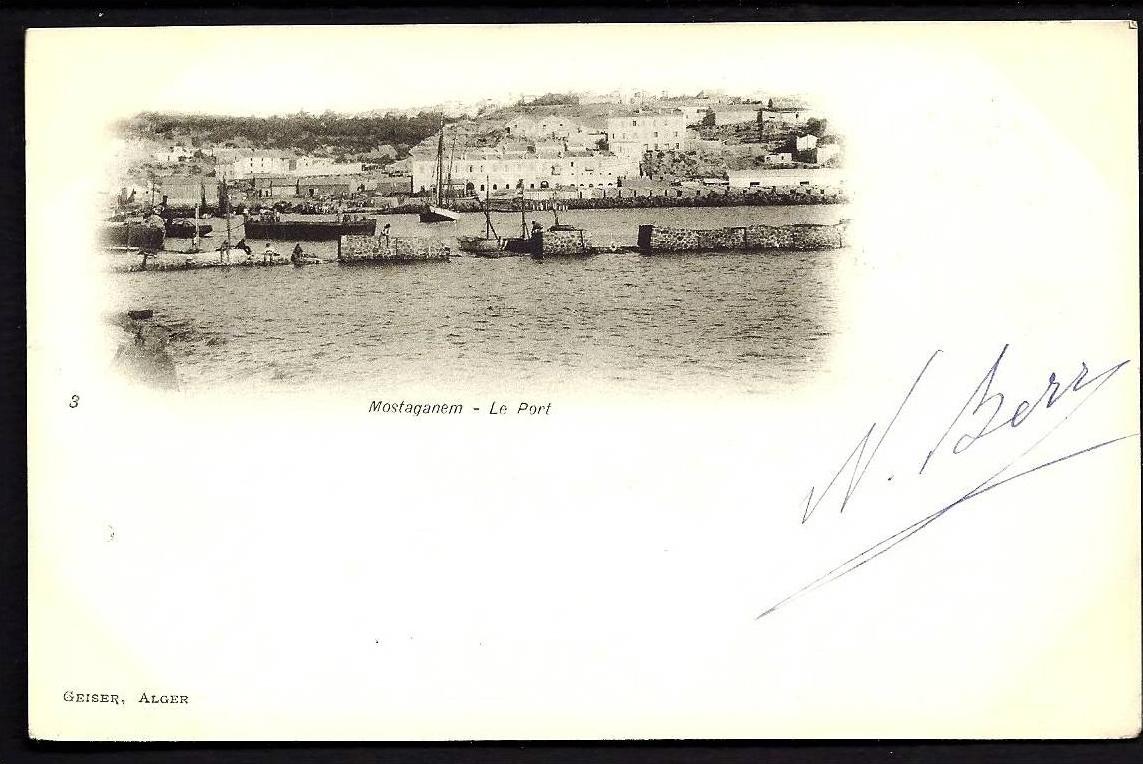 CPA  PRECURSEUR- ALGÉRIE- MOSTAGANEM- LE PORT EN GROS PLAN- DIGUE- BATEAUX- ANIMATION