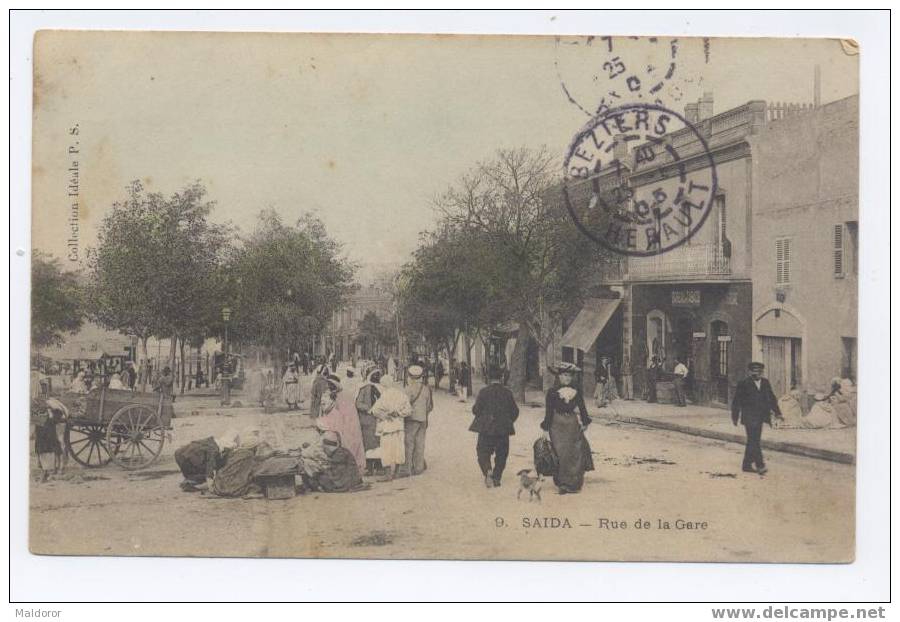 *non floue algerie    SAIDA    ** GARE    *  repas de famille.. sur l´avenue !!! en attendant train  ** VOIR DOS