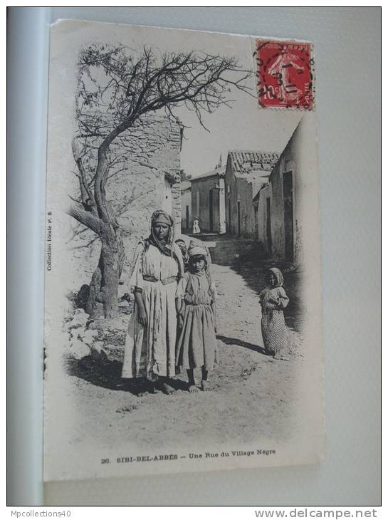 SIDI BEL ABBES - UNE RUE DU VILLAGE NEGRE - 1908 - ANIMATION -  (EDITIONS IDEALE P.S. N° 26)