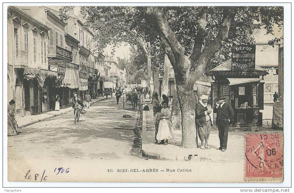 cpa bon etat ,   sidi-bel-abbes , carte tres rare , rue catina , animation , timbre courrier au verso , carte d'album