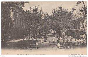 CPA  ALGERIE  SIDI BEL ABBES  Rue Prud' hon animée CAFE Terrasse HORLOGE