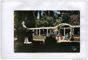 A2A T2 CARTE POSTALE ALGERIE SIDI-BEL-ABBES LE JARDIN PUBLIC LE JARDIN D'ENFANT BEAU VISUEL ANIMEE