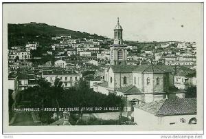 PHILIPPEVILLE-ABSIDE DE L'EGLISE ET VUE SUR LA VILLE
