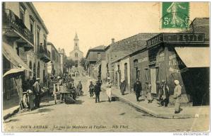 CPA Souk Arhas. La rue de Madaure et l´église.