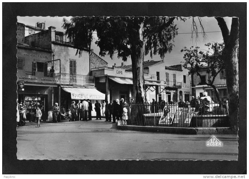 CPSM - TEBESSA - Place Carnot - ( Librairie Hachette - Epicerie Moderne - Café - Affiches de Cinéma )
