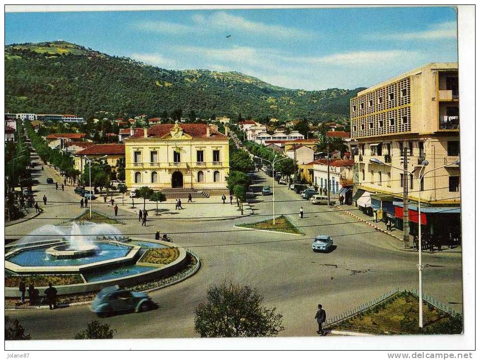 CPM   TIZI OUZOU      CENTRE VILLE       ROND POINT AVEC JET D EAU